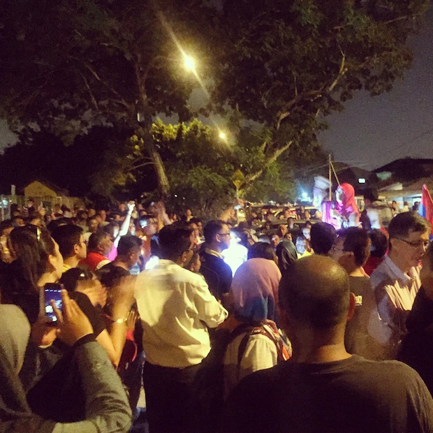 The crowd outside Jinjang lockup for a candlelight vigil in support of PKR vice president Nurul Izzah Anwar, March 16, 2015.