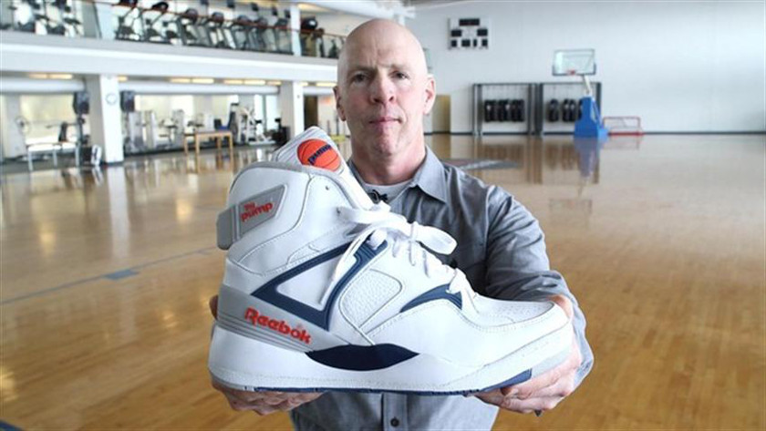 Paul Litchfield, the inventor of the Reebok Pump, holds up an example of the shoe that changed basketball in the 90's. — Bloomberg pic