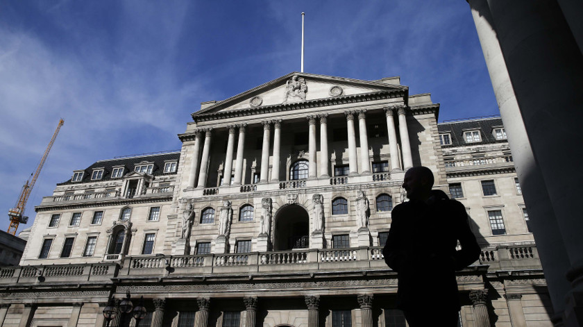A pedestrians walks under an arch opposite the Bank of England in London March 5, 2015. u00e2u20acu201d Reuters pic