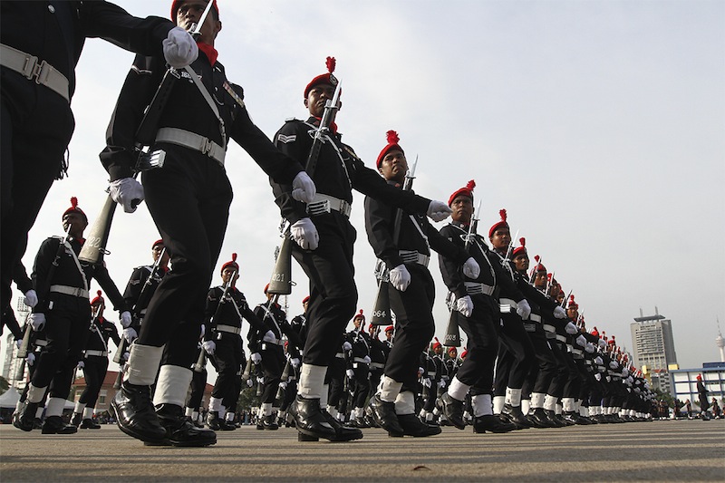 Members of The Royal Malaysian Police march during the 208th Police Day at the Police Training Centre in Kuala Lumpur, March 25, 2015.u00c2u00a0u00e2u20acu201d Picture by Yusof Mat Isa 