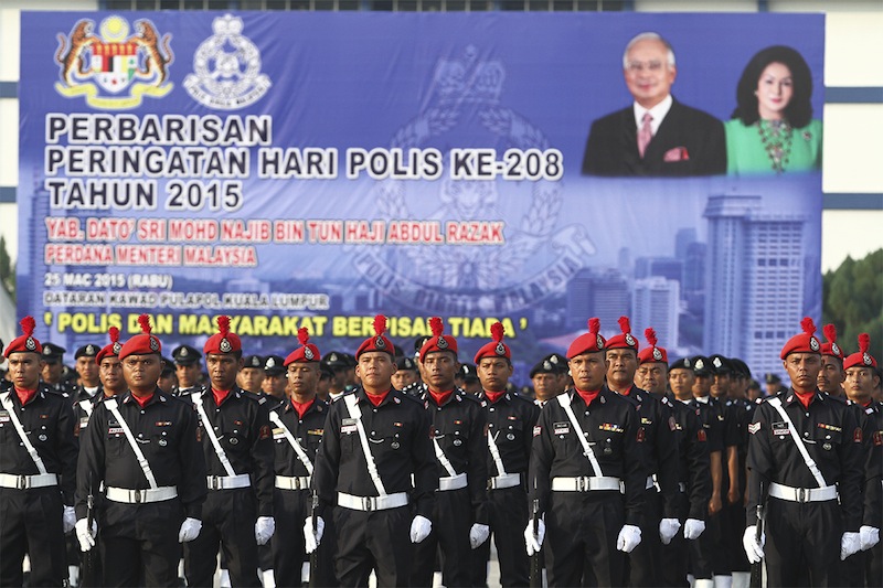 Members of The Royal Malaysian Police march during the 208th Police Day at the Police Training Centre in Kuala Lumpur, March 25, 2015.u00c2u00a0u00e2u20acu201d Picture by Yusof Mat Isa 