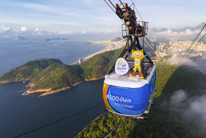 Rio 2016 Olympic mascot Vinicius is seen on the top of the Sugarloaf cable car, to mark 500 days to go until the Opening Ceremony of the 2016 Olympic Games in Rio de Janeiro, in this handout photograph released March 24, 2015.  u00e2u20acu201d Reuters pic