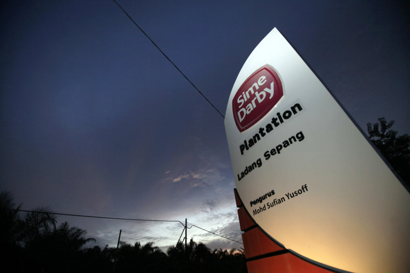 A Sime Darby logo is on display at the entrance to its plantation in Sepang outside Kuala Lumpur in this August 5, 2010 file photo. u00e2u20acu201d Reuters pic 