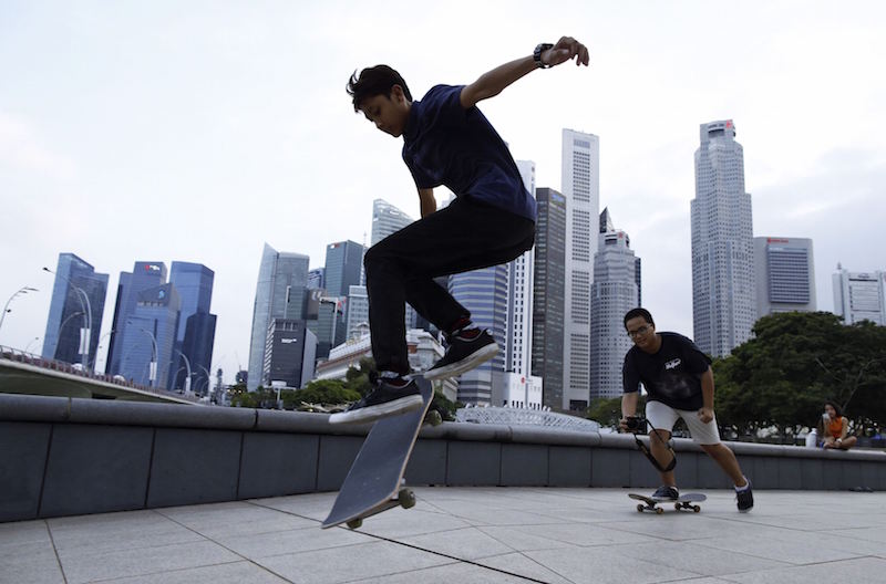 Youths skateboard in the evening at a park in the central business district in Singapore March 13, 2015. u00e2u20acu201d Reuters pic