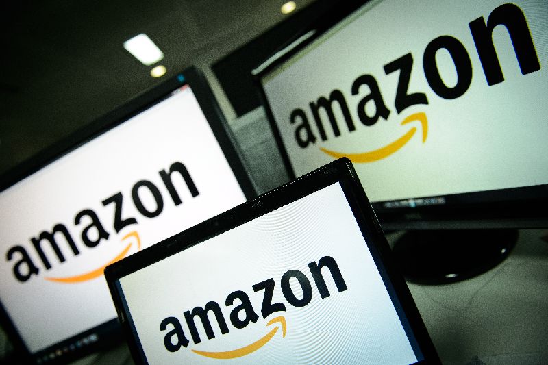 Amazonu00e2u20acu2122s new unlimited cloud storage service launched March 26, 2015, will cost as little as US$11.99 a year.u00c2u00a9AFP PHOTO / LEON NEAL