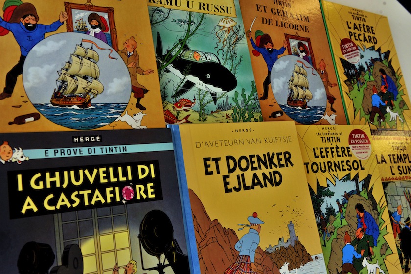 A picture taken on January 24, 2014 shows covers of comics series Tintin translated in several languages at the Casterman publisher headquarters in Brussels. u00e2u20acu201du00c2u00a0AFP picn