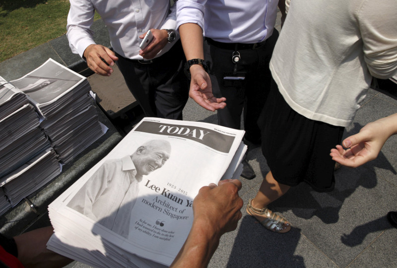 Special editions of newspapers bearing images of former prime minister Lee Kuan Yew are sold and distributed at the central business district in Singapore March 23, 2015. u00e2u20acu201d Reuters pic
