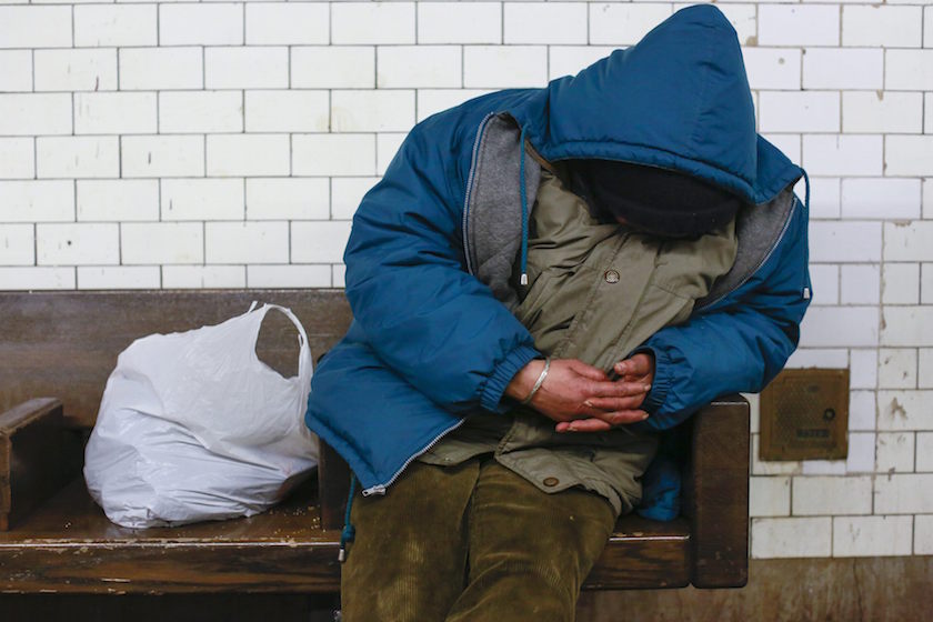 A man sleeps on a seat at the Borough Hall subway station in the Brooklyn borough of New York February 10, 2015. u00e2u20acu201d Reuters pic