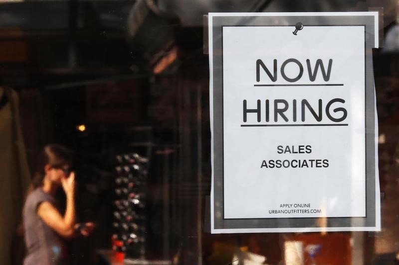 A u00e2u20acu02dcNow Hiringu00e2u20acu2122 sign hangs on the door to the Urban Outfitters store at Quincy Market in Boston, Massachusetts September 5, 2014. u00e2u20acu201d Reuters pic