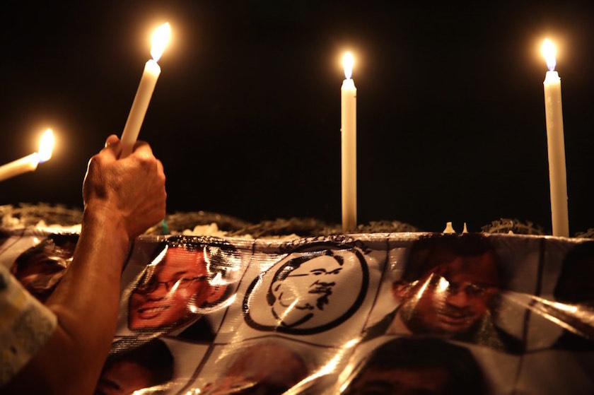 Lit candles are seen during a vigil for Datuk Seri Anwar Ibrahim outside the Sungai Buloh prison in Selangor March 5, 2015. u00e2u20acu201d Picture by Choo Choy May