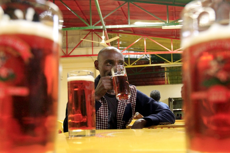 A customer drinks beer at the St. George breweryu00e2u20acu02dcs public pub in Ethiopiau00e2u20acu02dcs capital Addis Ababa, March 28, 2015. u00e2u20acu201d Reuters pic