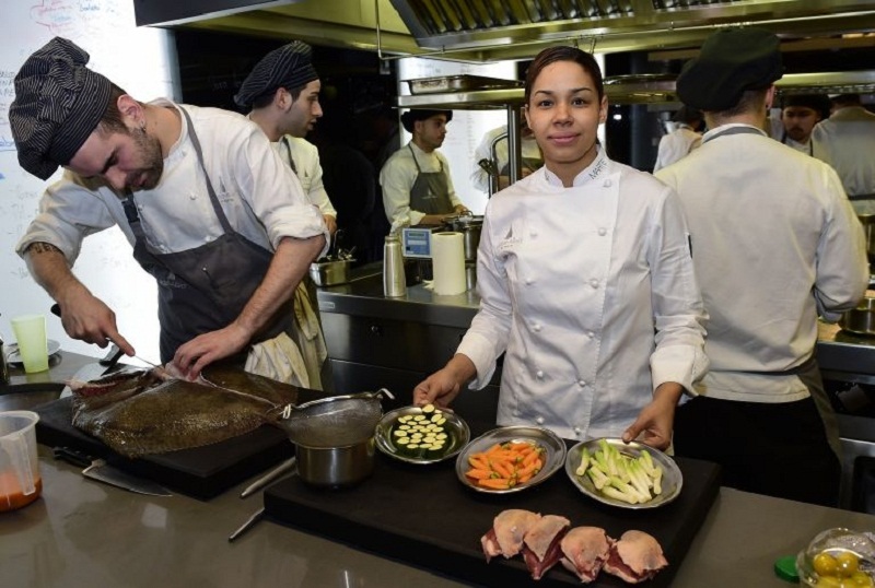 Dominican top chef Maria Marte (right) poses at the kitchen of the two Michelin stars restaurant El Club Allard in Madrid on March 13, 2015. u00e2u20acu201d AFP pic 