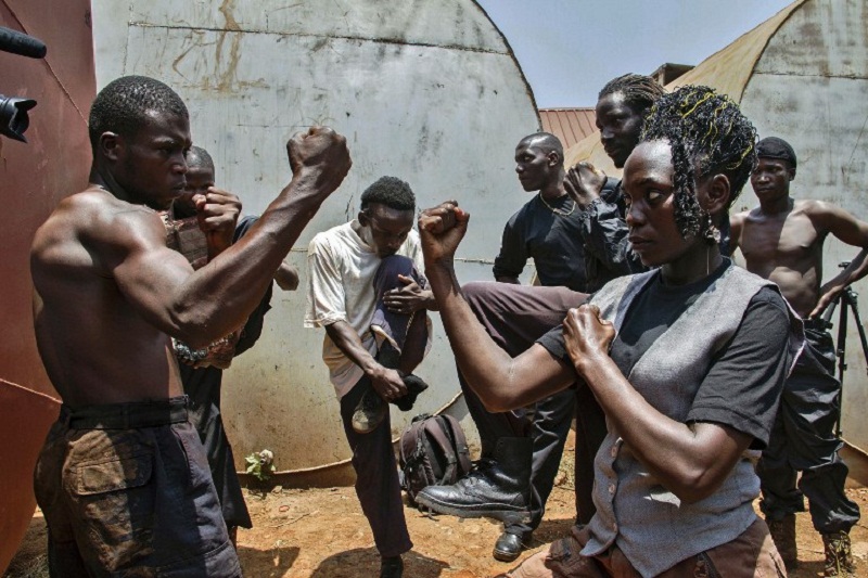 Ramon Film Productions and u00e2u20acu02dcWakaliwoodsu00e2u20acu2122 actors prepare for a scene in one of their upcoming movies in Kampala, on March 4, 2015. u00e2u20acu201d AFP pic