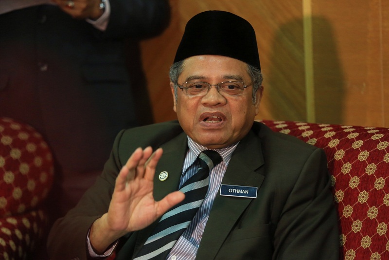 Director-General of the Malaysian Islamic Religious Development, Datuk Othman Mustapha, at the National Fatwa Council press conference in Putrajaya, April 20, 2015. u00e2u20acu201d Picture by Saw Siow Feng