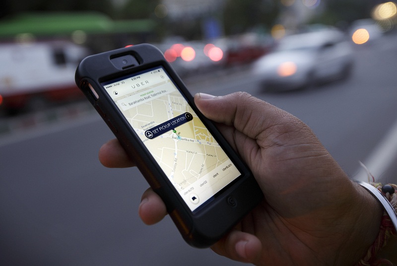 A smartphone shows Uberu00e2u20acu2122s application in Delhi, India, April 17, 2015. u00e2u20acu201d Picture by Kuni Takahashi for The New York Times