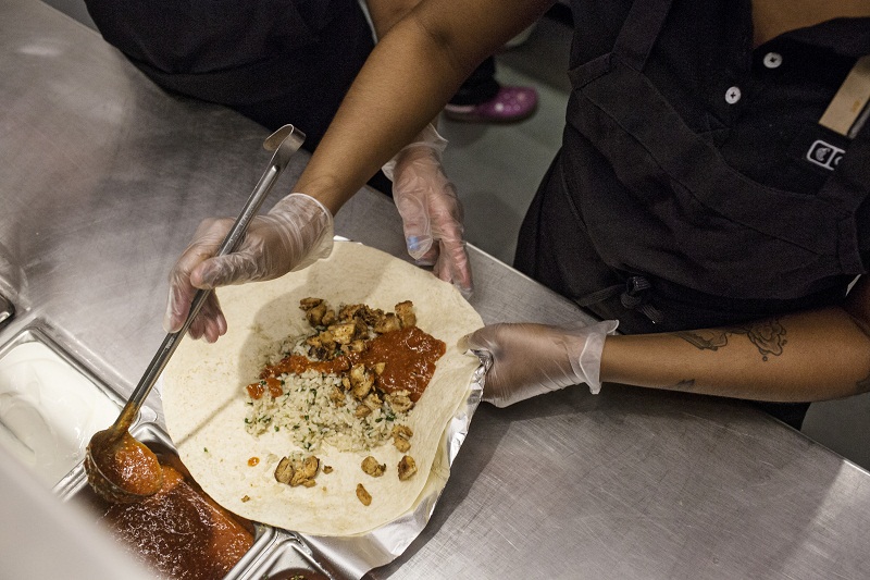 Eliminating genetically engineered ingredients is easier for Chipotle, where the entire menu uses just 68 ingredients, including salt and pepper, while one of its competitors uses 81 just to make a burrito. — Picture by Kirsten Luce for The New York Times