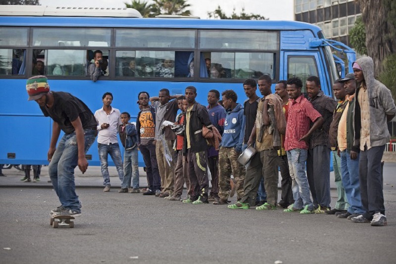 An Ethiopian skateboarder, part of the Ethiopia Skate organisation, skateboards as people watch in Addis Ababa, March 12, 2015. u00e2u20acu201d AFP pic