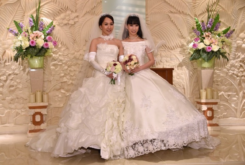 Japanese actress Akane Sugimori (right) and her partner Ayaka Ichinose, pose together at a press conference after their marriage ceremony in Tokyo, April 19, 2015. u00e2u20acu201d AFP pic
