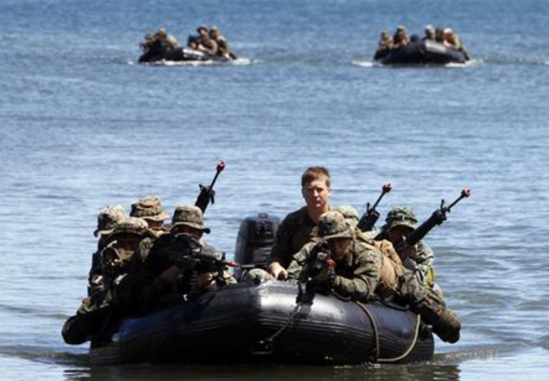 File picture shows Philippine and US marines sitting in rubber dinghies during an amphibious raid as part of a joint military exercise on the western coast of the Philippines in 2012. u00e2u20acu201d Reuters pic