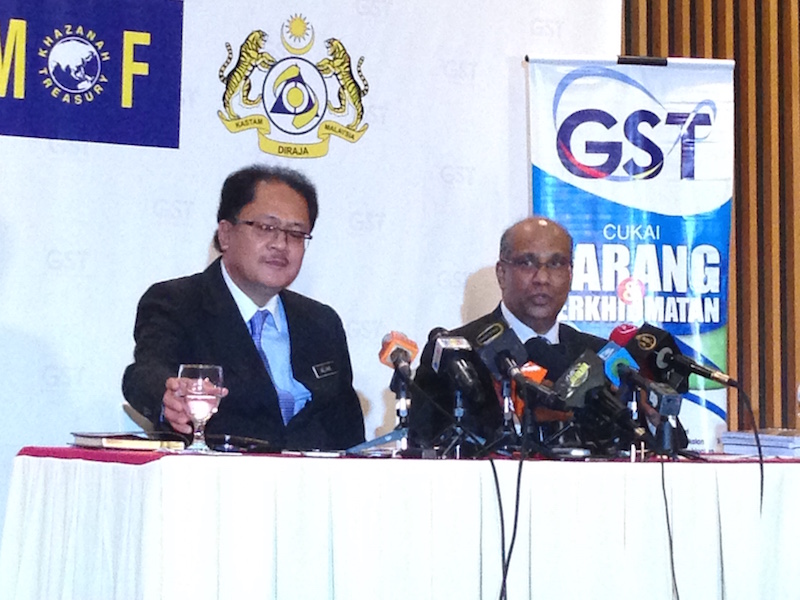 Domestic Trade, Cooperative and Consumerism Ministry secretary-general Datuk Seri Alias Ahmad and Customs GST director Datuk Subromaniam Tholasy speak to the media at the Finance Ministry in Kuala Lumpur April 1, 2015. u00e2u20acu201d Picture by Melissa Chi