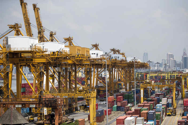 Shipping containers stand at a port in Bangkok March 30, 2015. The Thai export slump stretches to the third month in March.  u00e2u20acu201d Reuters pic