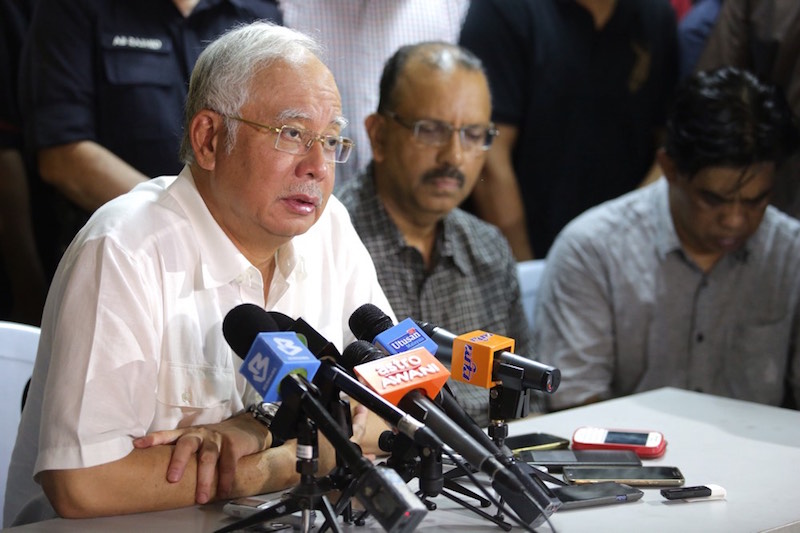 Prime Minister Datuk Seri Najib Razak speaks during a press conference at Kampung Pasir Baru in Semenyih April 4, 2015 following the helicopter crash. u00e2u20acu201d Picture by Choo Choy May