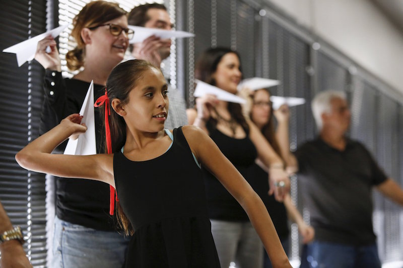 Lynzi Jessen, 10, prepares to launch a paper airplane during Captain Ron Nielsenu00e2u20acu2122s u00e2u20acu02dcFearless Flyingu00e2u20acu2122 class at Sky Harbour International Airport in Phoenix, Arizona April 4, 2015. u00e2u20acu201d Reuters pic