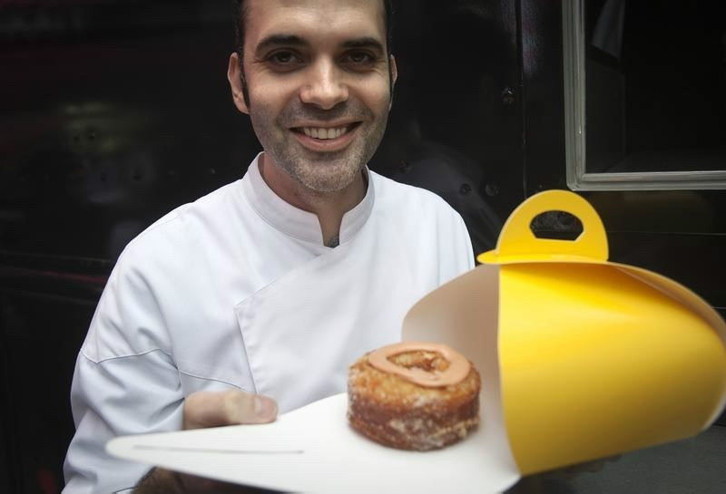 File picture shows celebrity baker Dominique Ansel, creator of the cronut, posing for a photo during a publicity event in Times Square in New York December 28, 2014. u00e2u20acu201d Reuters pic
