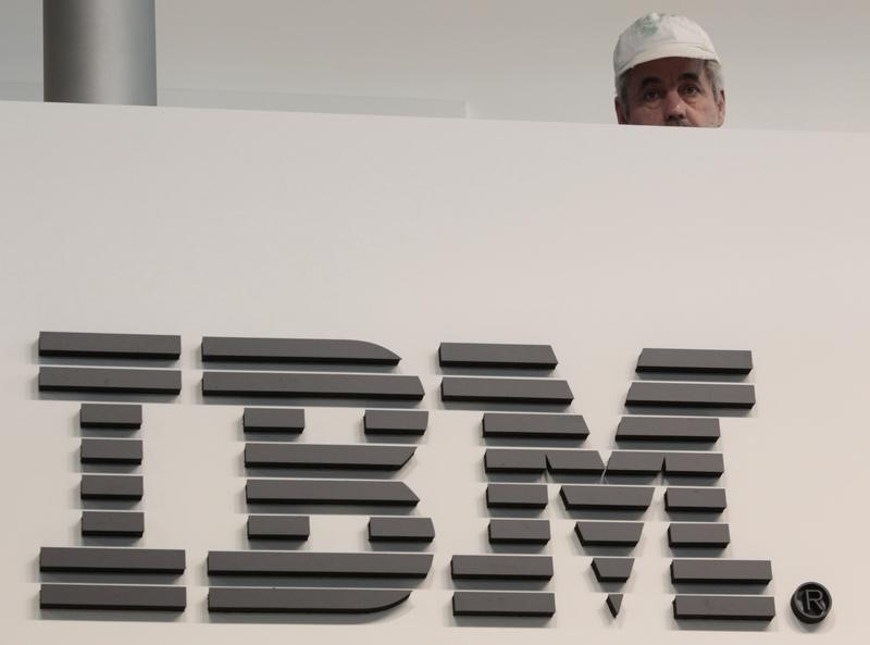 A worker behind a logo at the IBM stand on the CeBIT computer fair in Hanover February 26, 2011. IBM has exposed a new sophisticated cyber scam. u00e2u20acu201d Reuters pic