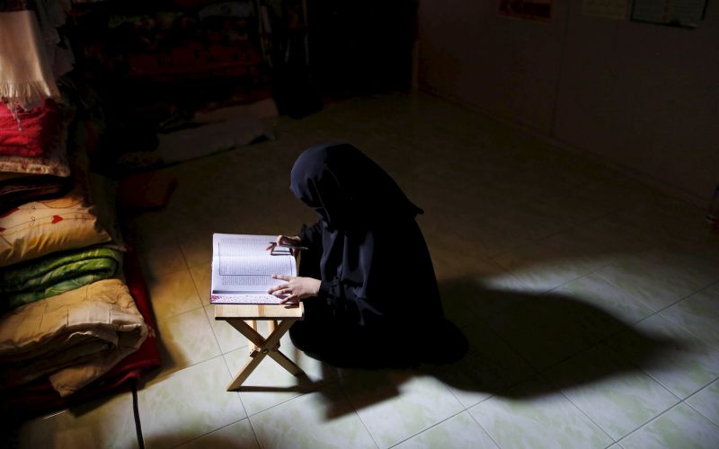 A female student studies the Quran in the women's quarters at Madrasah Ad-Diniyyah Al-Bakhriyyah in Kota Baru April 5, 2015. u00e2u20acu2022 Reuters pic
