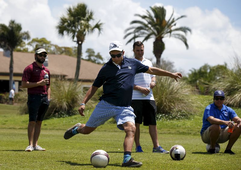 A FootGolfer kicks the ball down the fairway at Largo Golf Course in Largo, Florida, April 11, 2015. REUTERS/Scott Audette