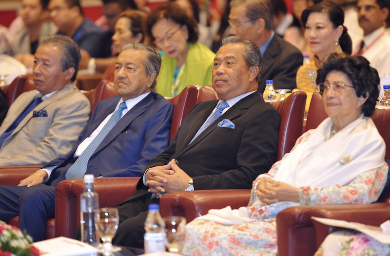Tun Dr Mahathir Mohamad and Deputy Prime Minister Tan Sri Muhyiddin Yassin attend an anti-war forum at Putra World Trade Centre in Kuala Lumpur April 19. 2015. u00e2u20acu201d Bernama pic