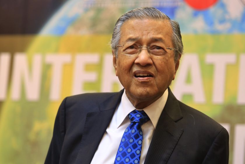 Tun Dr Mahathir responds to questions from reporters after delivering his keynote speech at an international forum in Putra World Trade Centre,  Kuala Lumpur, April 18, 2015. u00e2u20acu201d Picture by Saw Siow Feng