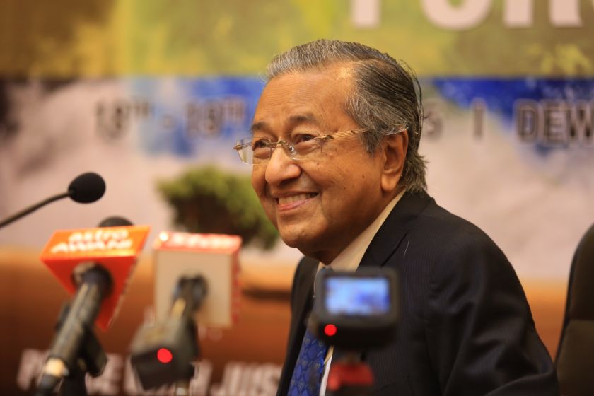 Tun Dr Mahathir smiles at a question posed by a reporter after delivering his keynote speech at an international forum in Putra World Trade Centre,  Kuala Lumpur, April 18, 2015. u00e2u20acu201d Picture by Saw Siow Feng
