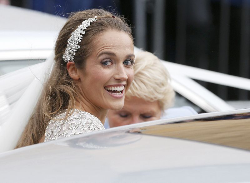 Kim Sears smiles as she leaves after marrying tennis player Andy Murray at the cathedral in Dunblane, Scotland, April 11, 2015 REUTERS/Russell Cheyne