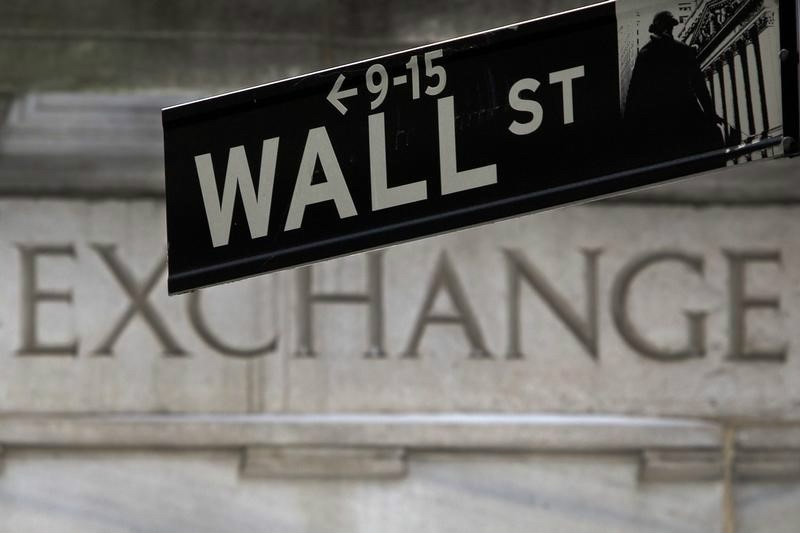 A Wall Street sign is pictured in front of the New York Stock Exchange, in the Manhattan borough of New York. u00e2u20acu201d Reuters pic
