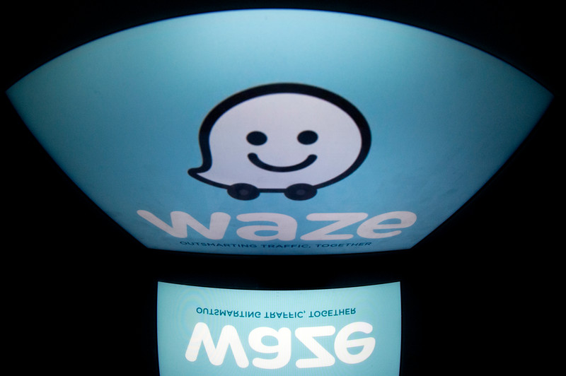 The logo of mobile app Waze is displayed on a tablet on January 2, 2014 in Paris. u00e2u20acu201d AFP pic