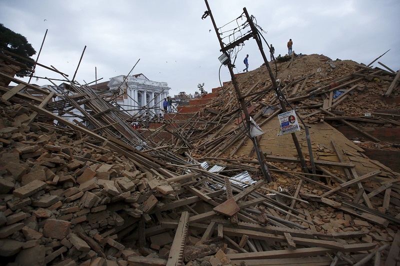 People work to rescue trapped people inside a temple in Bashantapur Durbar Square after an earthquake hit, in Kathmandu, Nepal, April 26, 2015. u00e2u20acu201d Reuters pic