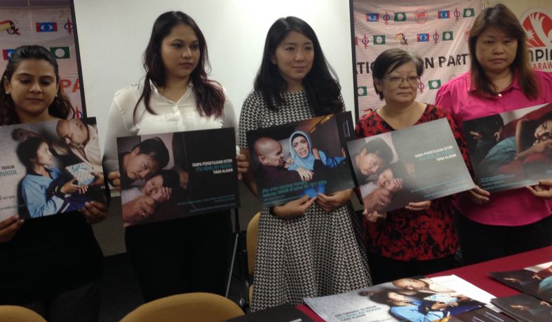 DAP Damansara Utama assemblyman Yeo Bee Yin (third left) and Awam's Betty Yeoh pose with promotional posters for the u00e2u20acu02dcRogol Adalah Rogol. Tiada Alasanu00e2u20acu2122 campaign. u00e2u20acu2022 Picture by Melissa Chi