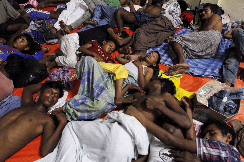 Migrants who arrived in Indonesia by boat rest inside a shelter in Kuala Langsa in Indonesia's Aceh Province May 16, 2015. — Reuters pic