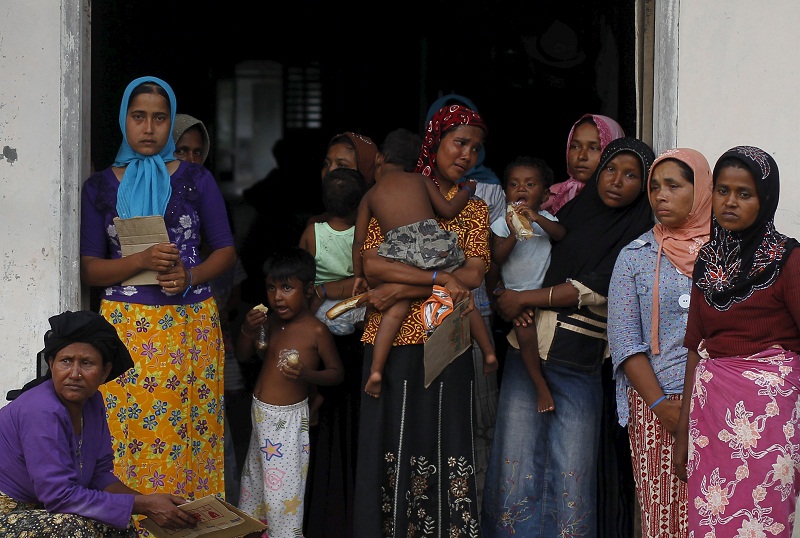 Rohingya migrant women, who recently arrived in Indonesia by boat, are seen inside a temporary compound for refugees in Aceh Timur regency, Indonesiau00e2u20acu02dcs Aceh Province May 21, 2015. u00e2u20acu201d Reuters pic