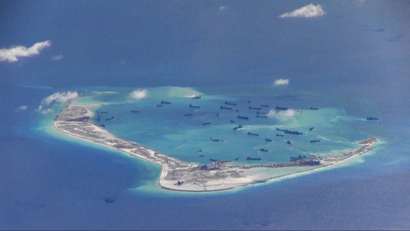Chinese dredging vessels are purportedly seen in the waters around Mischief Reef in the disputed Spratly Islands, May 21, 2015. u00e2u20acu201d Reuters pic