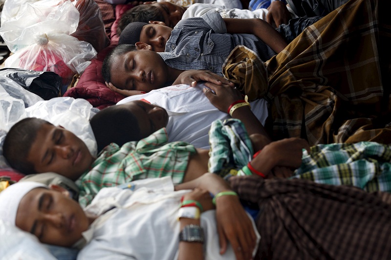Rohingya migrants who arrived in Indonesia last week by boat sleep in a tent at a temporary shelter in Aceh Timur regency near Langsa in Indonesiau00e2u20acu02dcs AcehProvince May 27, 2015. u00e2u20acu201d Reuters pic