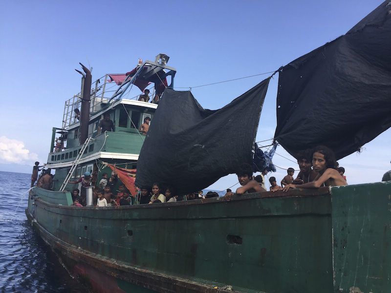 A wooden fishing boat carrying several hundred Rohingya migrants from Myanmar adrift west of the Thai mainland, May 14, 2015. u00e2u20acu201d Picture by Thomas Fuller for The New York Times