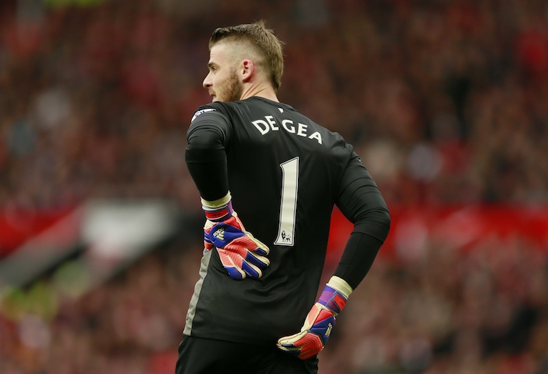Manchester United's David De Gea looks dejected after sustaining an injury before being substituted during the Barclays Premier League match between Manchester United and Arsenal at Old Trafford, May 17, 2015. u00e2u20acu201d Reuters pic