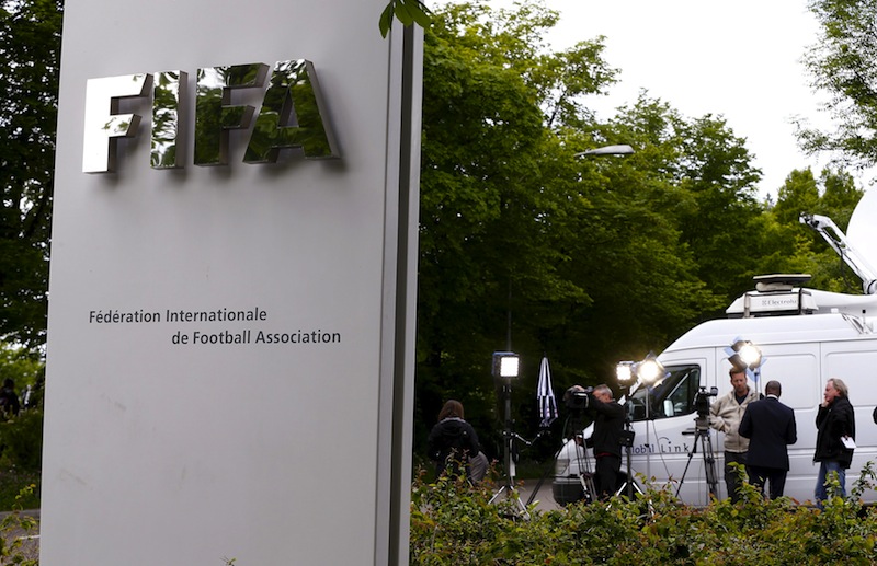 Members of the media stand in front of the entrance of the Federation Internationale de Football Association (FIFA) headquarters in Zurich, Switzerland, May 30, 2015. u00e2u20acu201du00c2u00a0Reuters pic