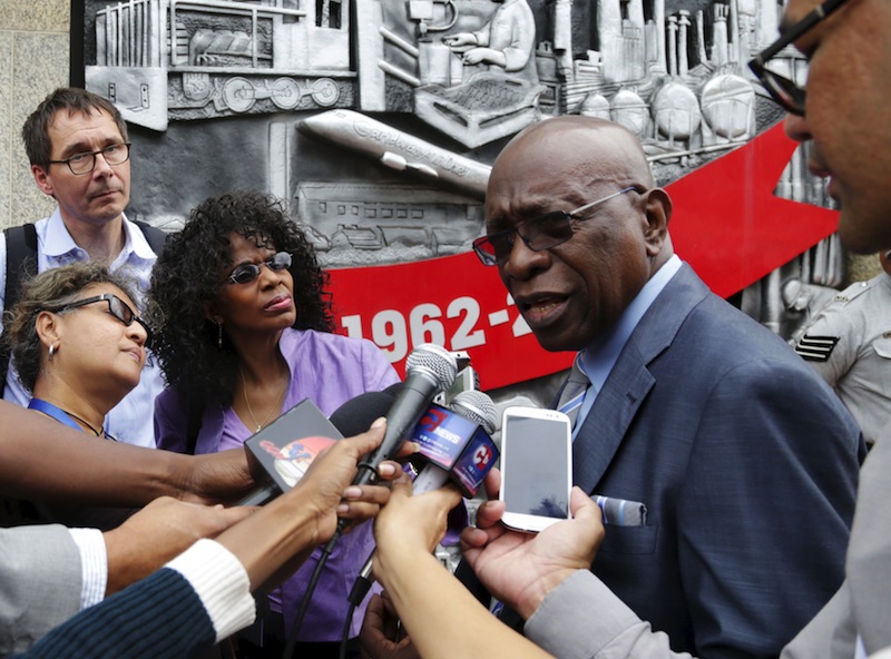 Former FIFA vice-president Jack Warner talks to journalists while arriving at the parliament building to attend a session in Port-of-Spain, May 29, 2015.u00c2u00a0u00e2u20acu201d Reuters pic