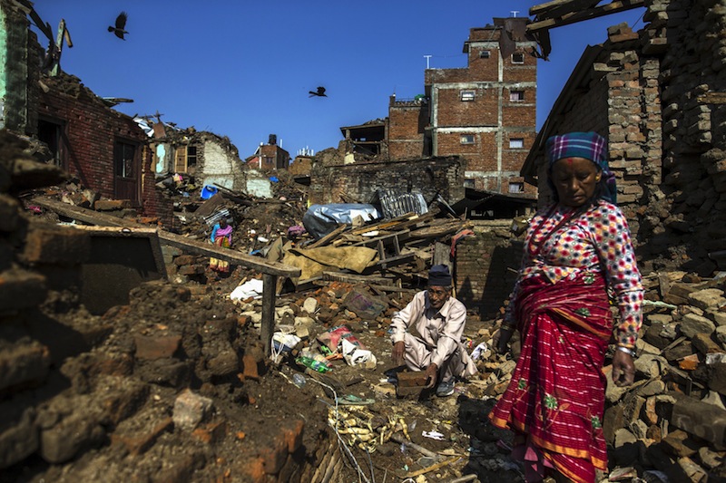Local residents clear rubble from the ruins of their home after the April 25 earthquake in Sankhu, on the outskirts of Kathmandu, Nepal, May 11, 2015. u00e2u20acu201d Reuters pic