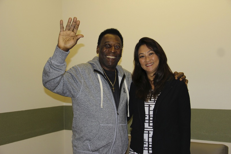 Brazilian legend Pele (left) waves with his wife Marcia Cibele Aoki at the Albert Einstein Hospital in Sao Paulo in this May 9, 2015 handout photograph from his family, courtesy of the hospital. u00e2u20acu201du00c2u00a0Reuters pic