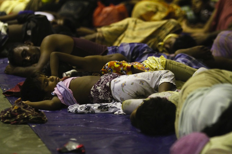 Migrants believed to be Rohingya rest inside a shelter after being rescued by fishermen at Lhoksukon in Indonesia's Aceh Province May 11, 2015. u00e2u20acu201du00c2u00a0Reuters pic
